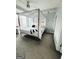 Stylish bedroom featuring a unique four-poster bed and neutral decor at 285 Centennial Olympic Park Drive Northwest Nw Dr # 1905, Atlanta, GA 30339