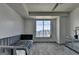 Bedroom featuring large window with city views and accent mirrored dresser at 285 Centennial Olympic Park Drive Northwest Nw Dr # 1905, Atlanta, GA 30339
