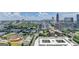 City skyline featuring skyscrapers and urban trees at 285 Centennial Olympic Park Drive Northwest Nw Dr # 1905, Atlanta, GA 30339