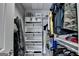 Well-organized walk-in closet with shelves, rods, and ample storage space at 285 Centennial Olympic Park Drive Northwest Nw Dr # 1905, Atlanta, GA 30339