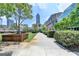 Exterior view of the community's manicured lawn and sidewalks, offering green space for residents at 285 Centennial Olympic Park Drive Northwest Nw Dr # 1905, Atlanta, GA 30339