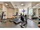 Well-equipped gym with treadmills, exercise bikes, and weightlifting machines for resident use at 285 Centennial Olympic Park Drive Northwest Nw Dr # 1905, Atlanta, GA 30339
