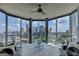 This modern living room boasts floor-to-ceiling windows with panoramic city views at 285 Centennial Olympic Park Drive Northwest Nw Dr # 1905, Atlanta, GA 30339