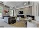 Inviting lounge with comfortable seating, grand piano, and modern decor for residents and guests at 285 Centennial Olympic Park Drive Northwest Nw Dr # 1905, Atlanta, GA 30339