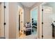 Hallway featuring access to bedroom and bathroom, offering functional storage and access at 2069 Countydown Ln, Stone Mountain, GA 30088