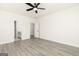 Large bedroom with doors to bathroom and closets and ceiling fan at 52 Cantrell Drive, Dallas, GA 30157