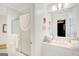 Clean, well-lit bathroom featuring a glass enclosed shower, ample counter space, and neutral decor at 606 Wingspread, Peachtree City, GA 30269