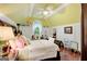 Cheerful bedroom with arched ceilings, and a cozy reading nook at 606 Wingspread, Peachtree City, GA 30269