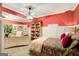 Cozy bedroom with ceiling fan, carpet and built in office/bookshelves at 606 Wingspread, Peachtree City, GA 30269