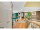 Hallway with wood floors, overlooking a living room at 606 Wingspread, Peachtree City, GA 30269