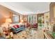 Cozy living room with natural light, and beautiful decor at 606 Wingspread, Peachtree City, GA 30269