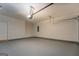 Spacious garage with a sealed concrete floor at 9187 Golfside Cir, Covington, GA 30014