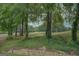 Golf course view from wooded area at 9187 Golfside Cir, Covington, GA 30014