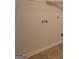 Close up of the laundry room connections and shelf at 9187 Golfside Cir, Covington, GA 30014