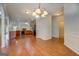 Inviting living space featuring hardwood floors and plenty of natural light at 9187 Golfside Cir, Covington, GA 30014
