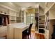 Spacious walk-in closet with custom shelving, a window for natural light, and a built-in desk at 705 Lawton Bridge Sw Rd, Smyrna, GA 30082