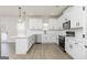 Modern kitchen featuring white cabinets, stainless appliances, and pendant lighting at 82 Cantrell Drive, Dallas, GA 30157
