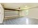 Spacious garage includes ample storage and a large garage door at 125 Selena Ct, Fayetteville, GA 30215