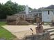 Amazing backyard with a large patio, tiered deck, and outdoor seating at 1455 River Cove Rd, Social Circle, GA 30025