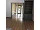 Inviting foyer with decorative glass door, tile flooring, and built-in shelving for added convenience at 1455 River Cove Rd, Social Circle, GA 30025