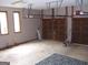 Large two car garage with windows and ample space for storage at 1455 River Cove Rd, Social Circle, GA 30025