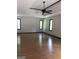 Spacious living room with hardwood floors, recessed lighting, and natural light at 1455 River Cove Rd, Social Circle, GA 30025
