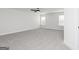 Large bedroom with neutral carpet and ample natural light from two windows at 676 Cantrell Drive, Dallas, GA 30157