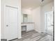 Bathroom featuring a vanity area with gray wood-look floors at 280 Limestone Circle, Conyers, GA 30013