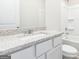 Bathroom featuring a granite vanity top, toilet, and tub/shower combo at 280 Limestone Circle, Conyers, GA 30013
