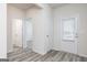 Bright entryway with wood-look floors and neutral paint at 280 Limestone Circle, Conyers, GA 30013