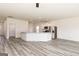 Modern kitchen with stainless steel appliances and a breakfast bar overlooking the living area at 280 Limestone Circle, Conyers, GA 30013