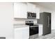 Well-equipped kitchen with stainless steel appliances and granite counters at 280 Limestone Circle, Conyers, GA 30013