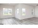 Spacious living room with multiple windows providing natural light at 280 Limestone Circle, Conyers, GA 30013