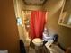 Bathroom with a shower and toilet at 6884 Red Maple Ct, Rex, GA 30273