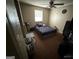 Bedroom with carpet, ceiling fan, and a window allowing for natural light at 6884 Red Maple Ct, Rex, GA 30273