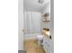 Cozy bathroom featuring shower with curtain, toilet, and vanity with a sink at 201 Greensprings Dr, Palmetto, GA 30268