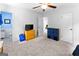 Well-lit bedroom with carpeted floor, natural light, and furnishings at 201 Greensprings Dr, Palmetto, GA 30268