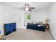 Bedroom with carpeted floor, natural light from the window, ceiling fan, and furnishings at 201 Greensprings Dr, Palmetto, GA 30268