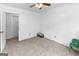 A bright bedroom with carpeted floors and white walls at 201 Greensprings Dr, Palmetto, GA 30268
