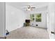 Bright bedroom with a ceiling fan, carpeted floor and natural light from the window at 201 Greensprings Dr, Palmetto, GA 30268