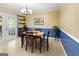 Comfortable dining area with natural light and backyard access at 201 Greensprings Dr, Palmetto, GA 30268