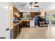 Traditional-style kitchen with wood cabinets and blue accents at 201 Greensprings Dr, Palmetto, GA 30268
