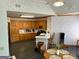 Well-equipped kitchen with ample cabinetry, a breakfast bar, and an adjacent dining area, perfect for Gathering meals at 9361 Arbor Glenn Ct, Jonesboro, GA 30236
