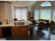 Bright and airy kitchen with ample counter space, a breakfast nook, and large windows overlooking the yard at 9361 Arbor Glenn Ct, Jonesboro, GA 30236