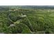 Aerial view showing the property's boundaries within a dense, wooded area at 185 Platinum Ridge Pt, Fayetteville, GA 30215