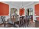 Sophisticated dining room with a view of a sweeping staircase and living area at 185 Platinum Ridge Pt, Fayetteville, GA 30215