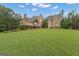 Spacious property with well-kept lawn and a handsome stone and brick home at 185 Platinum Ridge Pt, Fayetteville, GA 30215
