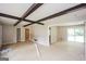 Open-concept living area with wood floors and access to multiple rooms at 2282 Belmont Dr, Decatur, GA 30032