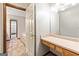 This bathroom has a vanity with drawers, a toilet, and a bathtub at 215 Longwood Dr, Jonesboro, GA 30236