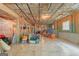 View of the unfinished basement area with exposed ceiling and open stud construction at 5130 Pratt Sw St, Covington, GA 30014
